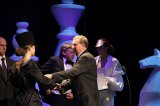 Ing.M.Blanárik, riaditeľ úseku komunikácie odovzdáva v zastúpení predsedu predstavenstva PSS, a. s., Ing. I. Béreša cenu Bytový dom roka 2010<br />autor foto: Roman Skyba